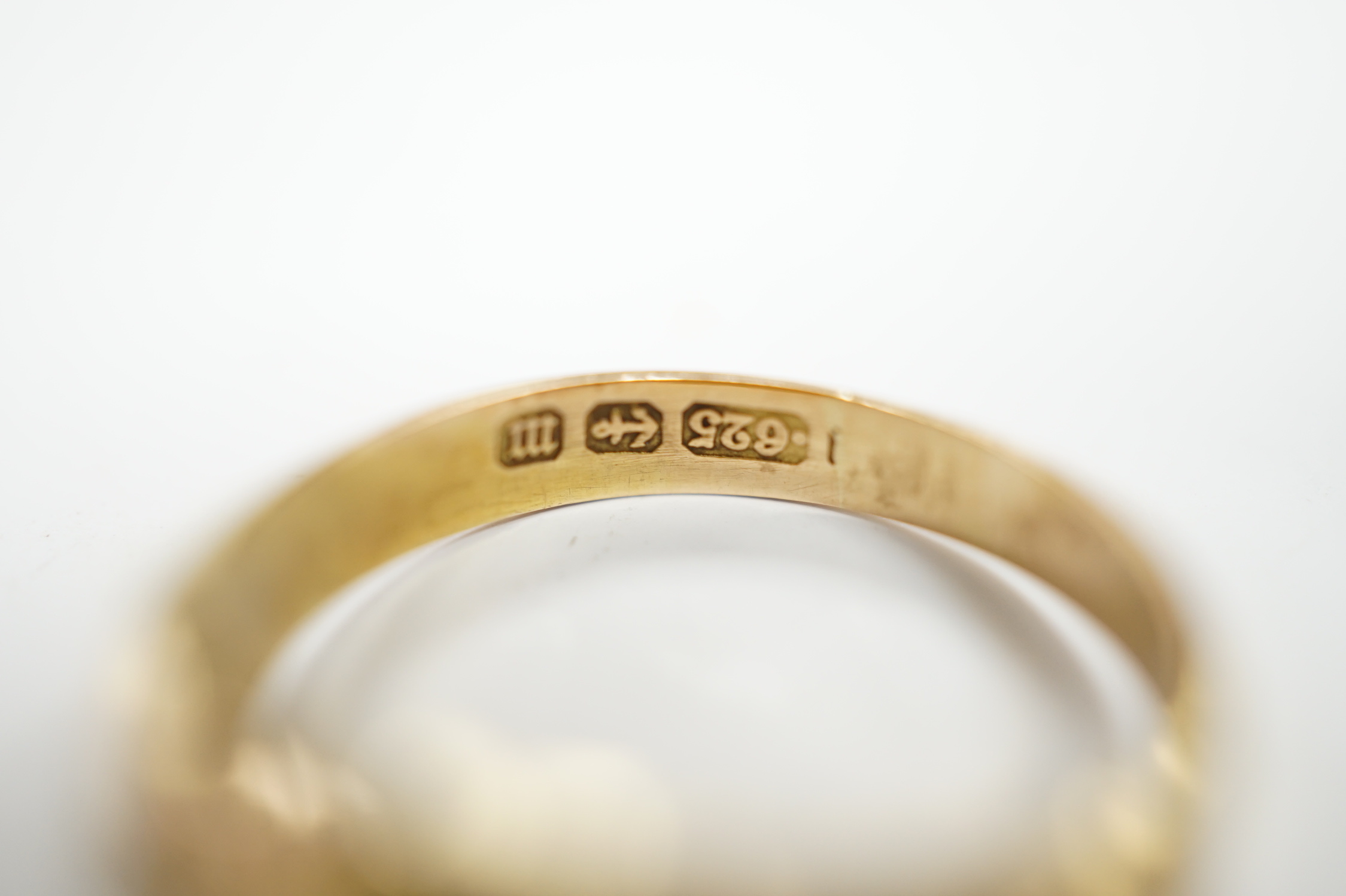 A late Victorian 15ct gold, ruby and split pearl set half hoop ring, size M, gross weight 2.7 grams.